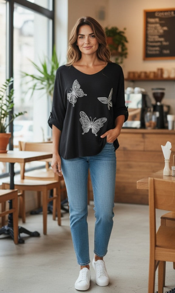 Musta perhosneule bling-yksityiskohdilla – pehmeä ja lämmin pusero