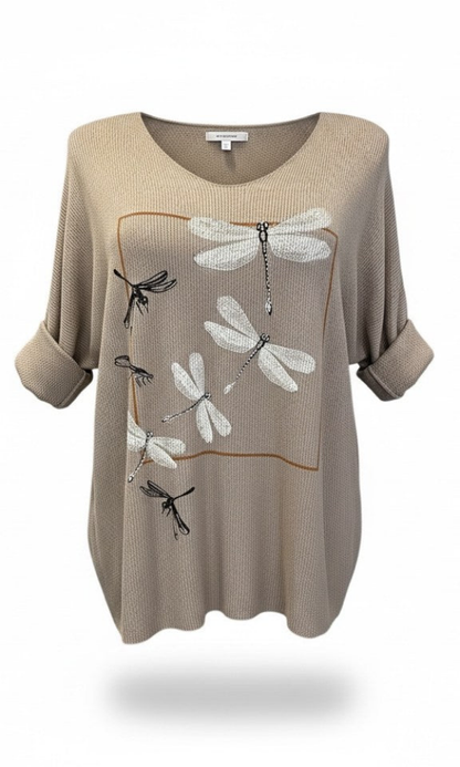 Beige sudenkorentopusero yhdistettynä farkkuihin – tyylikäs arkiasu